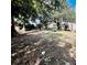 Expansive backyard featuring scattered shade and ample room for outdoor activities or future development at 5809 County Road 547 N, Davenport, FL 33837