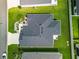 Aerial view of home showcasing roof, backyard, and surrounding neighborhood at 6633 Holovak Ter, The Villages, FL 34762