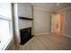 Bedroom featuring a fireplace, and plenty of natural light from a window at 664 Mission Hills Trl, The Villages, FL 32162