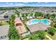A birds eye view of community pool, playground, lounge and landscaped recreation area at 678 Blackstone St, Minneola, FL 34715