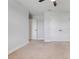 Inviting bedroom featuring neutral carpet, baseboards, and a closet for ample storage at 678 Blackstone St, Minneola, FL 34715