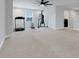 Versatile bonus room with gym equipment, soft carpet, and ample space for activities at 678 Blackstone St, Minneola, FL 34715