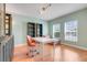 Bright and spacious office with hardwood floors, two large windows, and custom built ins at 678 Blackstone St, Minneola, FL 34715