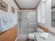 Bright bathroom featuring a walk-in shower and elegant fixtures at 71 Stone Haven Ct, Leesburg, FL 34788