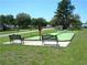Play shuffleboard on this charming court with inviting benches, perfect for enjoying leisurely outdoor activities at 71 Stone Haven Ct, Leesburg, FL 34788