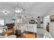 Open concept: view of the kitchen, dining area, and living room at 8635 Se 156 St, Summerfield, FL 34491