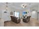 Inviting living room with modern flooring and comfortable seating arrangements at 8635 Se 156 St, Summerfield, FL 34491