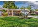 Charming single-story home featuring an attached garage and inviting front porch at 8738 Sw 95Th Ln # B, Ocala, FL 34481