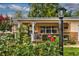 Charming home featuring a cozy front porch with beautiful landscaping and an inviting curb appeal at 8738 Sw 95Th Ln # B, Ocala, FL 34481