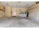 Spacious garage with washer, dryer and sink perfect for laundry and projects at 8738 Sw 95Th Ln # B, Ocala, FL 34481