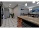 Spacious kitchen featuring a breakfast bar and modern appliances at 8738 Sw 95Th Ln # B, Ocala, FL 34481