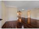 Spacious living room featuring polished hardwood floors, neutral paint, and bright, inviting natural light at 8738 Sw 95Th Ln # B, Ocala, FL 34481
