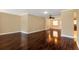 Spacious living room with hardwood floors, ceiling fan and natural light at 8738 Sw 95Th Ln # B, Ocala, FL 34481