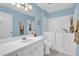 Bright bathroom featuring a walk-in bathtub and updated fixtures, offering accessibility and style at 8932 Se 168Th Sedgwick Pl, The Villages, FL 32162
