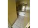Bright bathroom with white vanity and tiled floors, reflecting natural light at 8932 Se 168Th Sedgwick Pl, The Villages, FL 32162