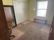 Neutral bedroom with closet and large window offering sunlight, perfect for relaxing and unwinding at 8932 Se 168Th Sedgwick Pl, The Villages, FL 32162
