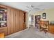 Versatile bedroom featuring a Murphy bed and custom built-ins providing ample storage and functionality at 8932 Se 168Th Sedgwick Pl, The Villages, FL 32162