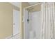 Shower featuring an adjustable shower head and a curtain for privacy in the bathroom at 8932 Se 168Th Sedgwick Pl, The Villages, FL 32162
