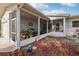 Enclosed patio with tiled flooring, screening, and ample light at 1 Aberdeen Cir, Leesburg, FL 34788