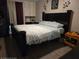 Bedroom featuring a large bed and a modern closet. Comfortable and relaxing at 1051 S Highland St # D-E, Mount Dora, FL 32757