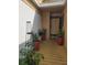 Inviting entryway with plants and a view of the front door, creating a warm welcome at 1051 S Highland St # D-E, Mount Dora, FL 32757