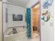 Bathroom featuring tub with shower curtain, and a separate shower with glass door at 1202 Del Toro Dr, Lady Lake, FL 32159