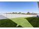 Expansive fenced backyard with well-maintained lawn at 12624 Ne 49Th Dr, Oxford, FL 34484