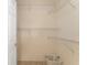 Walk-in closet with wire shelving and tile flooring at 12687 Se 90Th Ter, Summerfield, FL 34491
