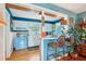 Bright kitchen with bar seating and a retro range at 1301 North Ave, Tavares, FL 32778