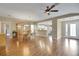 Open dining room features hardwood floors, ample space, and convenient access to the kitchen at 13050 Se 89Th Cir, Summerfield, FL 34491