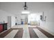 Spacious garage with ample storage, laundry area and plenty of room for parking at 13050 Se 89Th Cir, Summerfield, FL 34491
