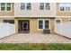Back patio with privacy fence, access to screened in patio and air conditioner at 14430 Desert Haven St # 4302, Windermere, FL 34786