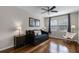 Cozy bedroom featuring hardwood floors, neutral walls, and comfortable furniture at 14430 Desert Haven St # 4302, Windermere, FL 34786