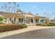 Charming community clubhouse featuring a welcoming porch and well-maintained landscaping at 14430 Desert Haven St # 4302, Windermere, FL 34786