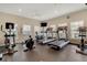 Well-equipped fitness center with treadmills, elliptical machines, and other exercise equipment at 14430 Desert Haven St # 4302, Windermere, FL 34786