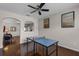 Game room with hardwood floors, modern ceiling fan and ping pong table at 14430 Desert Haven St # 4302, Windermere, FL 34786