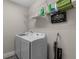 Laundry room with a modern washer and dryer, and plenty of storage space at 14430 Desert Haven St # 4302, Windermere, FL 34786