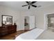 Spacious main bedroom with hardwood floors and en-suite bathroom at 14430 Desert Haven St # 4302, Windermere, FL 34786