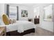 This bedroom features a large window and a view of the ensuite bathroom at 14513 Winter Stay Dr, Winter Garden, FL 34787