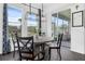 Dining area featuring a modern table and chairs with lots of natural light and views to the outside at 14513 Winter Stay Dr, Winter Garden, FL 34787