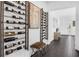 Hallway featuring stylish wine racks, decor, and tile floors at 14513 Winter Stay Dr, Winter Garden, FL 34787