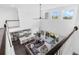 Open-concept living room with high ceilings, a modern kitchen, and a comfortable seating area at 14513 Winter Stay Dr, Winter Garden, FL 34787