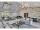 Elegant lobby with modern furniture, high ceilings, and stylish chandeliers providing a welcoming space at 14513 Winter Stay Dr, Winter Garden, FL 34787