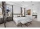 Neutral main bedroom features gray walls, a tray ceiling, and carpet floors at 14513 Winter Stay Dr, Winter Garden, FL 34787