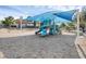 Shaded playground with slides, swings, and climbing structures, creating a safe and fun environment for  at 14513 Winter Stay Dr, Winter Garden, FL 34787
