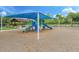 Community playground with slides, climbing structures, and shaded picnic area at 14513 Winter Stay Dr, Winter Garden, FL 34787