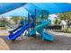 Shaded playground with slides, swings, and climbing structures, creating a safe and fun environment for  at 14513 Winter Stay Dr, Winter Garden, FL 34787