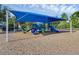 Shaded playground with slides, swings, and climbing structures, creating a safe and fun environment for  at 14513 Winter Stay Dr, Winter Garden, FL 34787