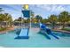 A community pool featuring a waterpark area with slides and dumping bucket at 14513 Winter Stay Dr, Winter Garden, FL 34787