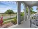 Inviting front porch featuring beautiful landscaping and comfortable seating at 14513 Winter Stay Dr, Winter Garden, FL 34787